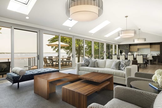 Bright living room with lake view, designed by MA Peterson in Twin City