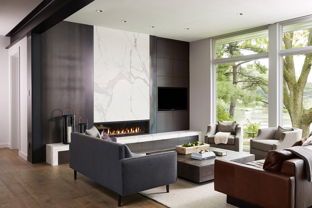 Elegant living room featuring a marble fireplace and lake view, MA Peterson, Twin Cities
