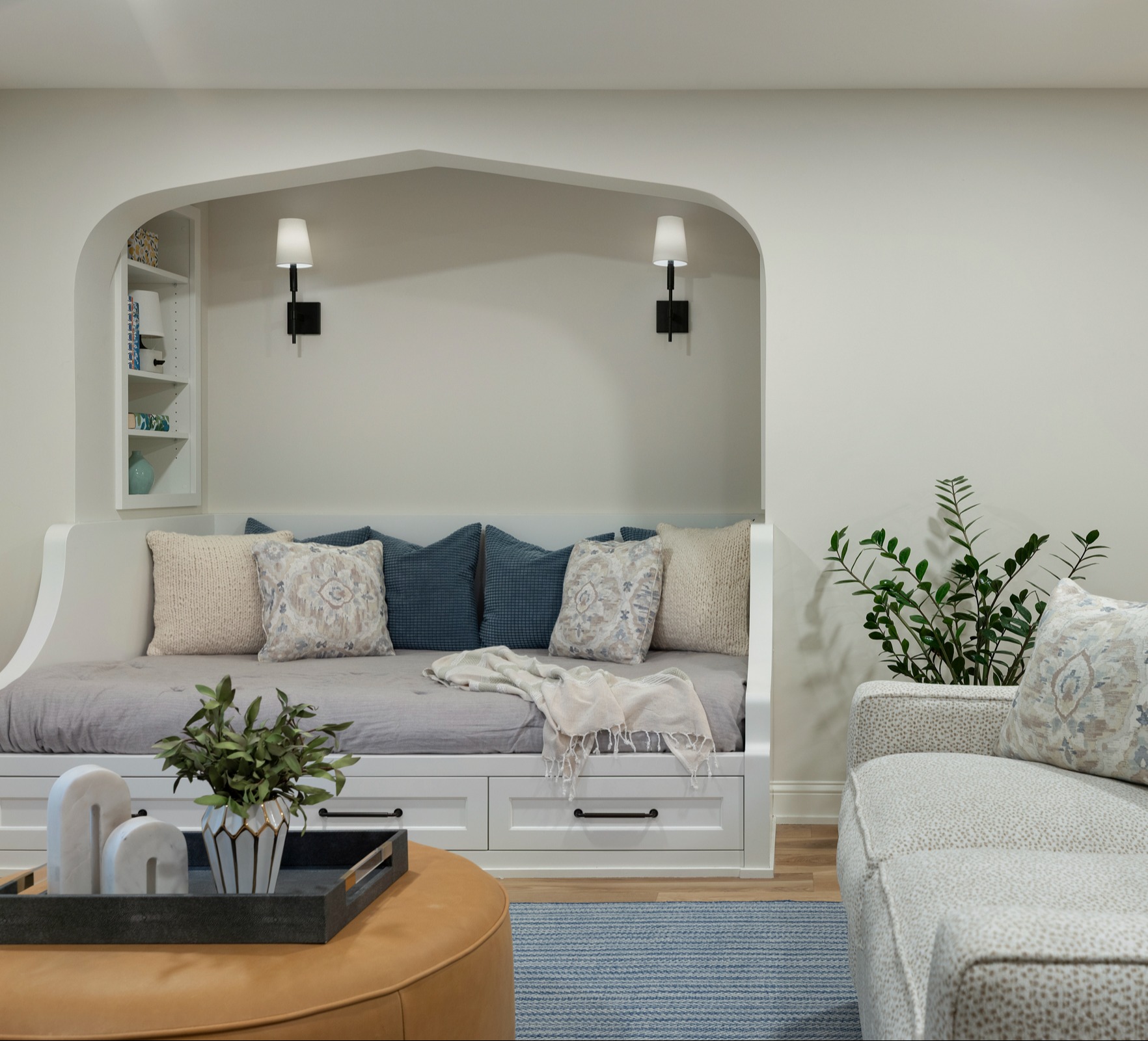 Built-in daybed with custom cushions and integrated wall paneling