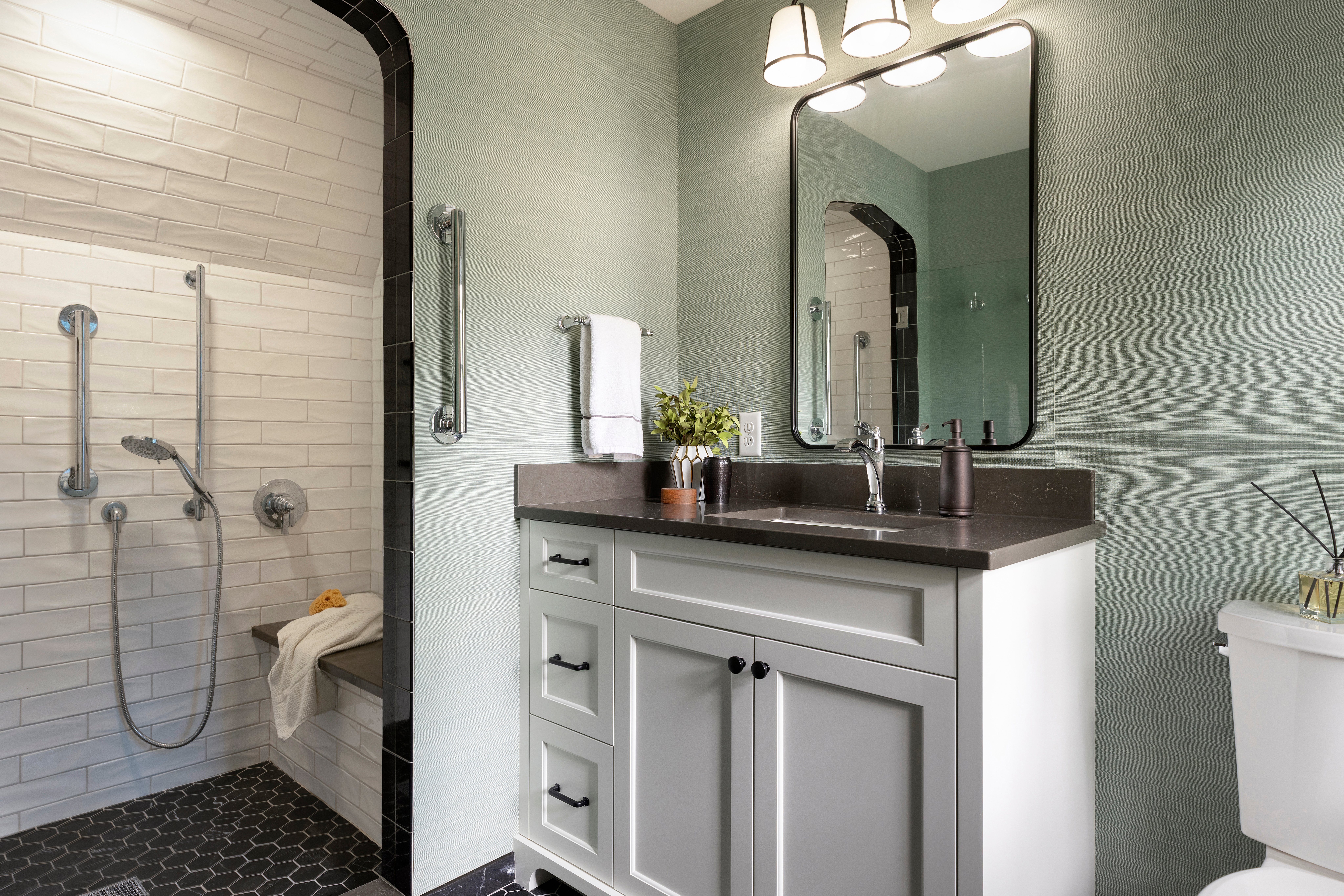 Contemporary bathroom with textured tile walls and clean-lined fixtures