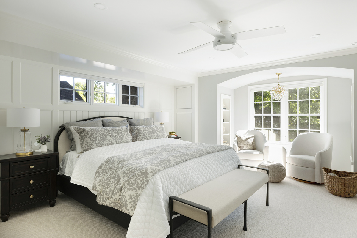 Bright bedroom with white millwork details