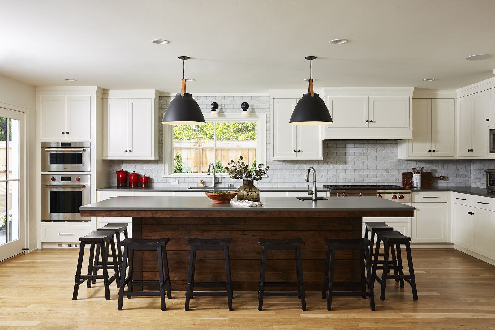 Spacious kitchen with large island and modern lighting in a Twin Cities remodel by MA Peterson