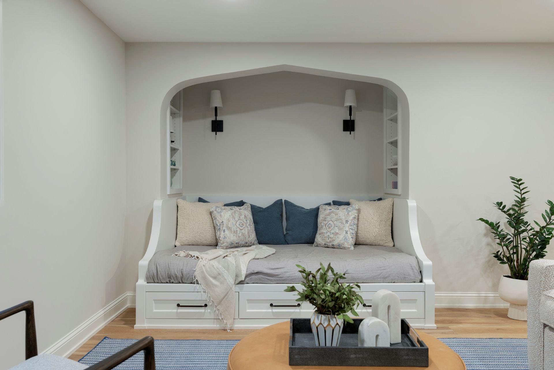 Finished lower level with a built-in daybed nook by MA Peterson, Twin Cities