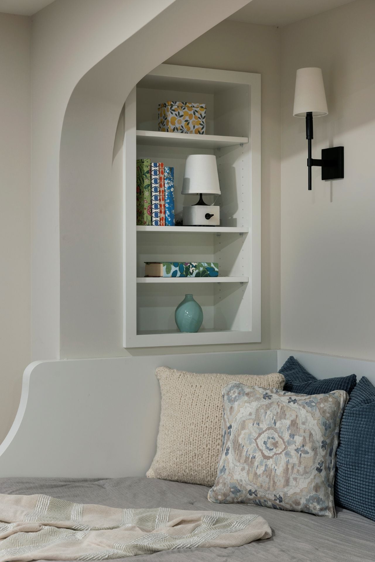 Built-in shelving detail in a finished lower level by MA Peterson, Twin Cities