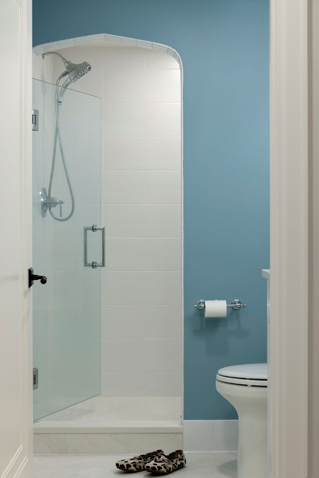 Lower level bathroom with a tiled walk-in shower by MA Peterson, Twin Cities